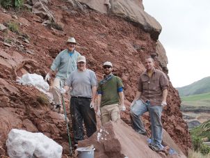Researchers Prof. Robert Reisz, unknown field assistant, Dr. David Evans, A.Prof Eric Roberts (ϲʿ) at the excavation site in South Africa
